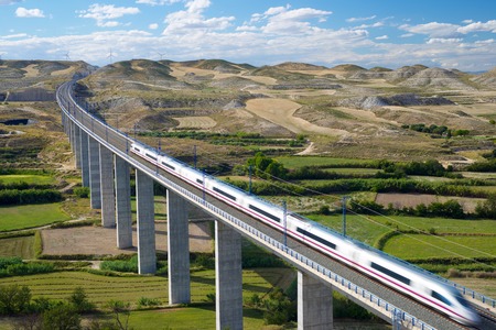 view of a high-speed train crossing a viaduct in Roden, Zaragoza, Aragon, Spain. AVE Madrid Barcelona.の写真素材