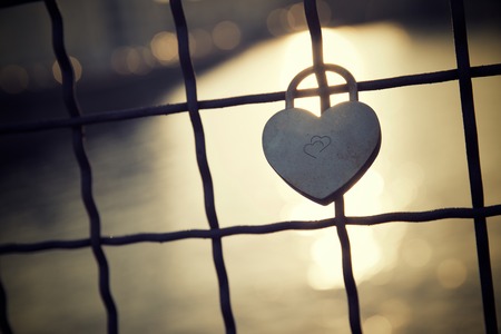 Love padlock on the railing of a bridge, Berlin, Germany.