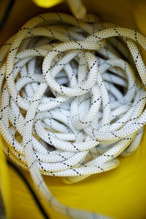 Climbing rope inside a yellow backpack.の写真素材