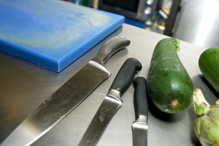 Vegetables and cooking utensils in a restaurant.