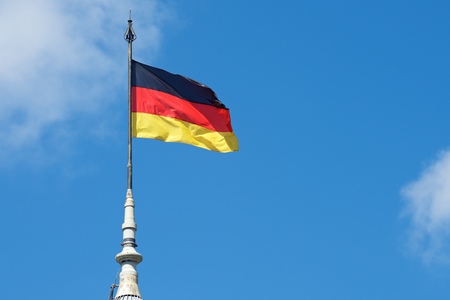 German national flag waving in the wind.の写真素材