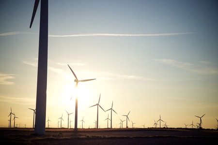 Windmills for electric power production at sunset, Zaragoza Province, Aragon, Spain
