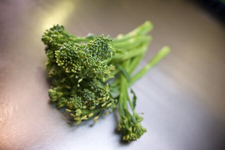 Bimi vegetable on a metal surface.の写真素材