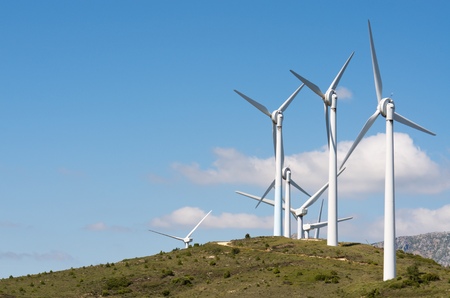 aligned group of windmills for renewable electric energy production, Navarre, Spain