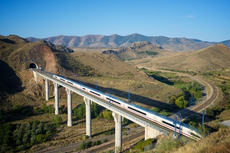 view of a high-speed train crossing a viaduct in Purroy, Zaragoza, Aragon, Spain. AVE Madrid Barcelona.の写真素材