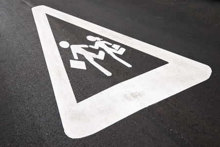 Traffic sign warning of the proximity of a school.の写真素材