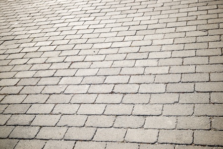 Floor of a street with stone tiles.