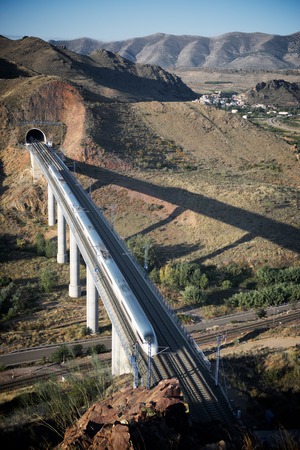 view of a high-speed train crossing a viaduct in Purroy, Zaragoza, Aragon, Spain. AVE Madrid Barcelona.のeditorial素材