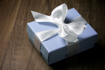 Luxury box tied with a white ribbon.の写真素材