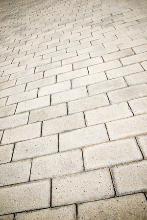 Floor of a street with stone tiles.