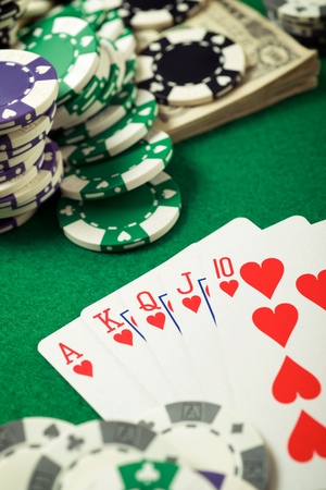 view of a gaming table with green mat