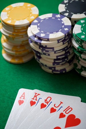 view of a gaming table with green mat