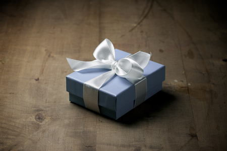 Luxury box tied with a white ribbon.の写真素材