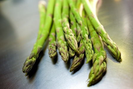 Asparagus vegetable on a metal surface.の写真素材