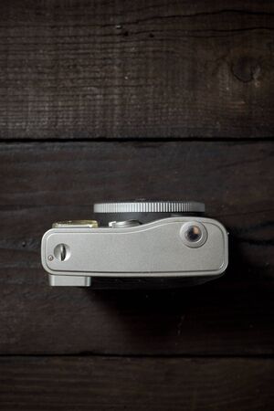 Vintage camera view on a wood table.の写真素材