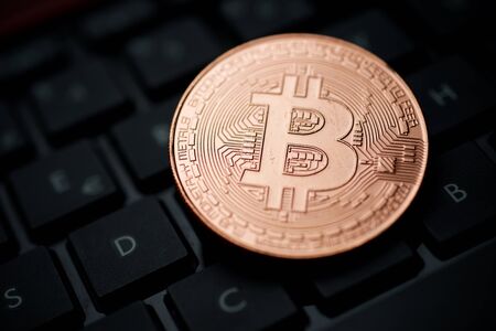 Bitcoin on a keyboard computer.の写真素材