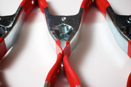 Clamps on a white table