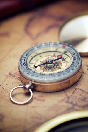 Vintage compass and old navigation map.の写真素材