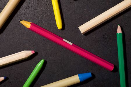 Group of pencils on a table.