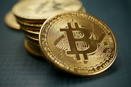 Bitcoins on a wood table.の写真素材
