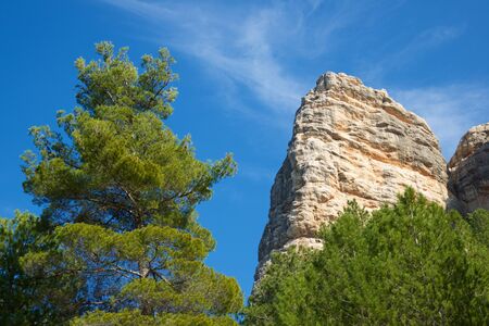 Rock wall, named as Masmut Rocks, in Penarroya de Tastavins, Teruel, Aragon, Spain.の写真素材