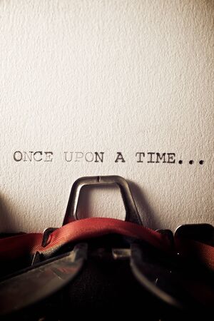 The sentence, once upon a time, written with a typewriter.の写真素材