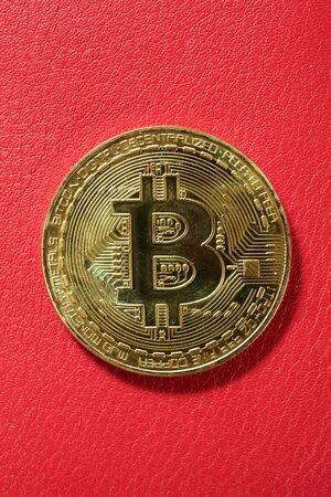 Bitcoin on a leather surface.の写真素材