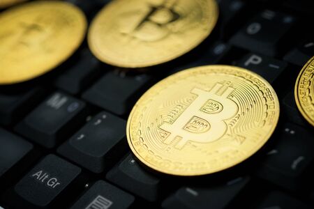 Bitcoins on a keyboard computer.
