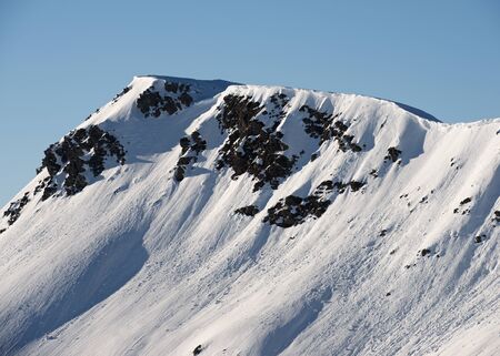 Snowy peak in Canfranc Valley, Pyrenees, Huesca, Aragon, Spain.