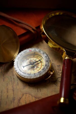Vintage compass and old navigation map.の写真素材