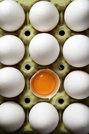 Chicken eggs in a cardboard box.