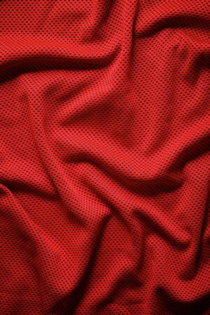 Close up of a garnet colored fabric.の写真素材