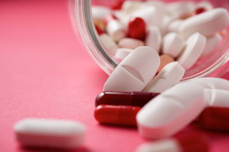 Pills in a glass bottle.