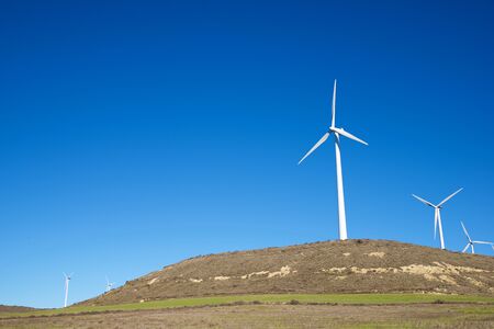 Windmills for electric power production, Huesca province, Aragon in Spain.