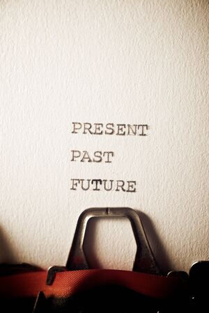 The words present, past and future, written with a typewriter.の写真素材
