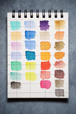 Watercolor test card on a sketchpad.の写真素材