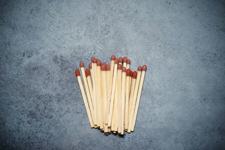 Matches on a stone table.の素材 [FY310145277560]