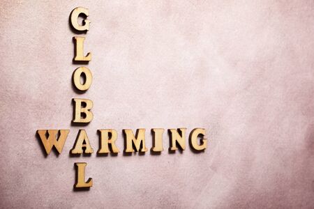 Global warming text on a colored paper.の写真素材