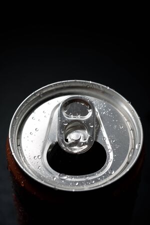 Close-up of a can of soda on a table.の写真素材