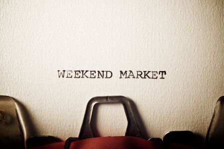 The sentence weekend market written with a typewriter.の写真素材
