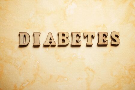 Diabetes text on a colored paper.の写真素材