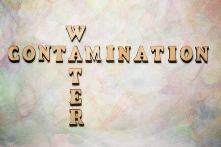 Water Contamination text in a colored paper.の写真素材