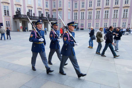 Prague, Czech Republic - October 12, 2008: Three uniformed guards parading in Prague Castle.