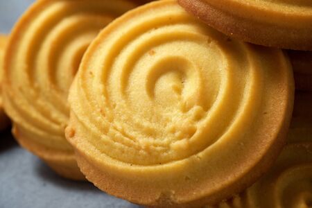 Butter cookies on a stone table.