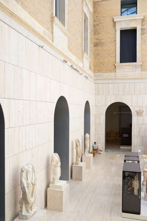 Madrid, Spain - June 15, 2014: tourist visiting the National Archaeological Museum.