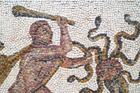 Madrid, Spain - June 15, 2014: roman mosaic detail in National Archaeological Museum.