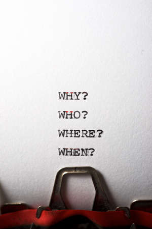 Why, who, where and when questions written with a typewriter.の写真素材