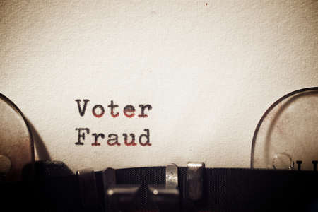 Voter fraud phrase written with a typewriter.の写真素材