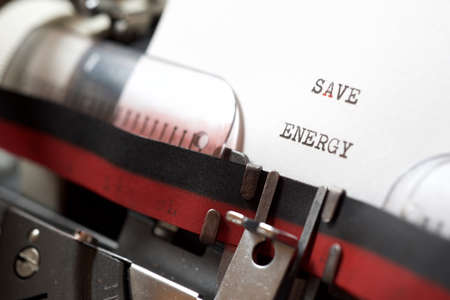 Save energy phrase written with a typewriter.