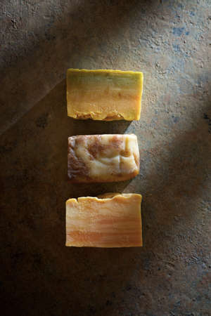 Bars of artisan soap on a table.の写真素材